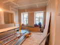 Material for repairs in an apartment is under construction remodeling rebuilding and renovation. Making walls from gypsum plasterboard or drywall.